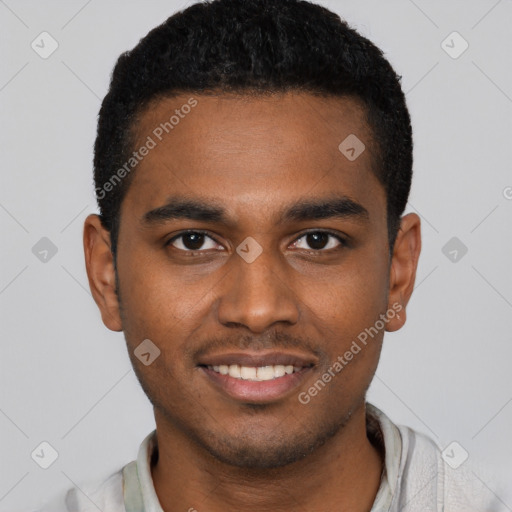 Joyful black young-adult male with short  black hair and brown eyes