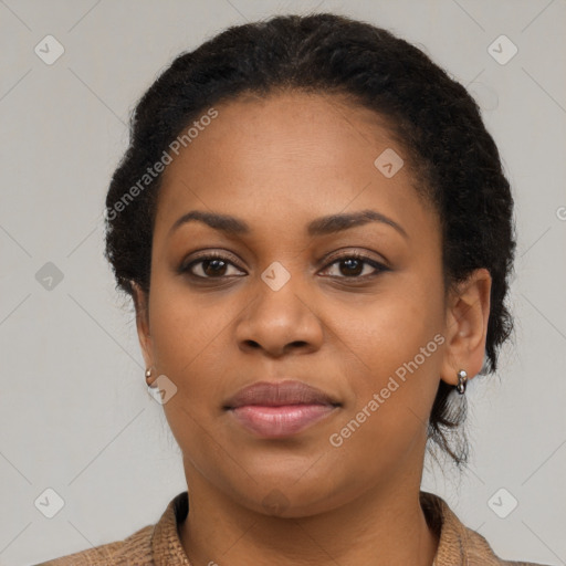 Joyful black young-adult female with medium  brown hair and brown eyes