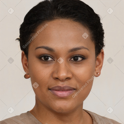 Joyful black young-adult female with short  brown hair and brown eyes