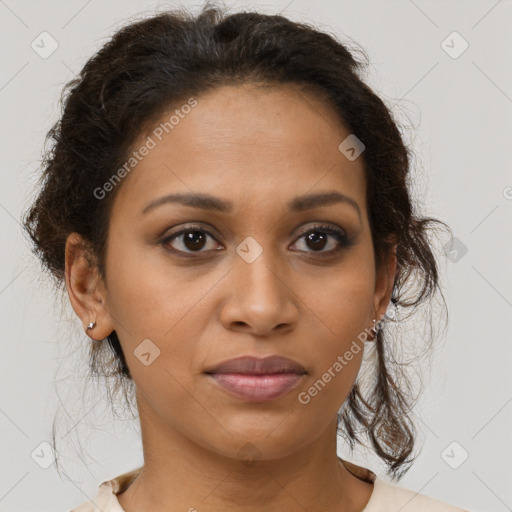 Joyful black young-adult female with medium  brown hair and brown eyes