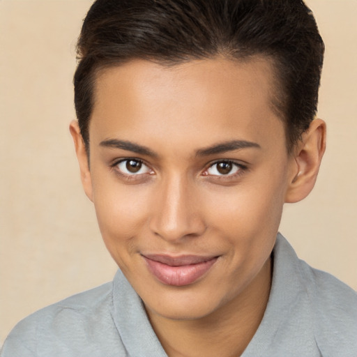 Joyful white young-adult female with short  brown hair and brown eyes