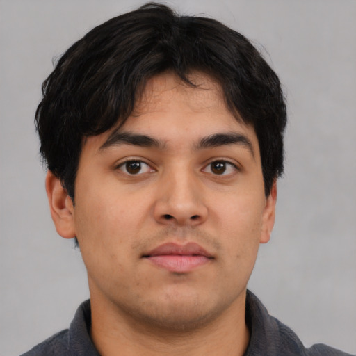 Neutral asian young-adult male with short  brown hair and brown eyes