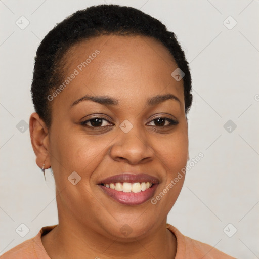 Joyful black young-adult female with short  brown hair and brown eyes