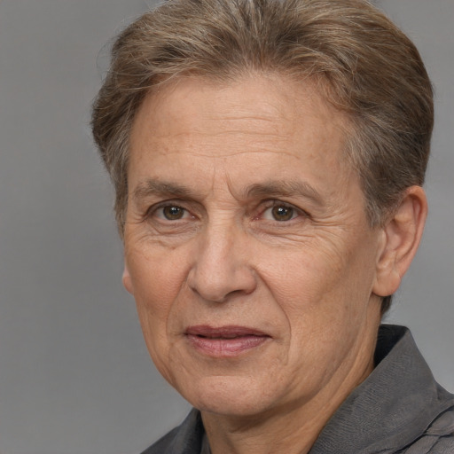 Joyful white middle-aged male with short  brown hair and brown eyes