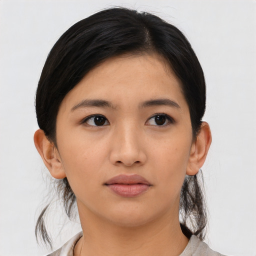 Neutral asian young-adult female with medium  black hair and brown eyes