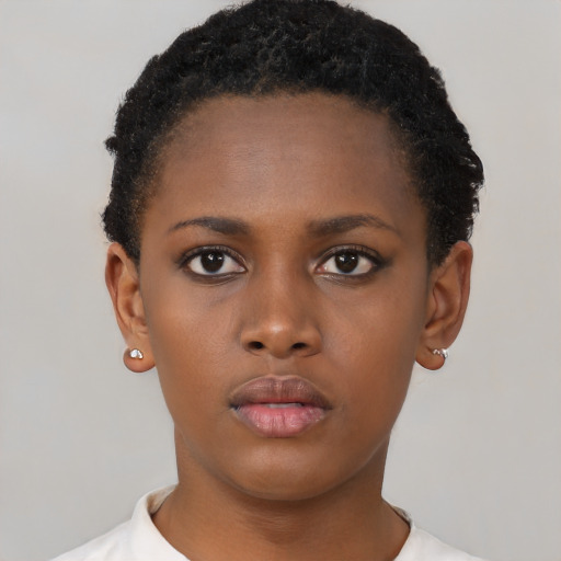 Neutral black child female with short  brown hair and brown eyes