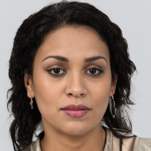 Neutral latino young-adult female with long  black hair and brown eyes