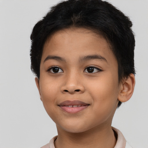 Joyful asian child female with short  brown hair and brown eyes