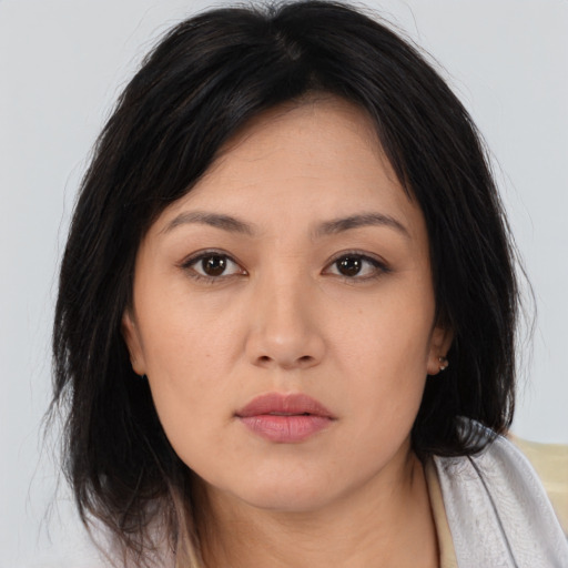 Neutral asian young-adult female with medium  black hair and brown eyes