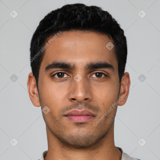 Neutral latino young-adult male with short  black hair and brown eyes