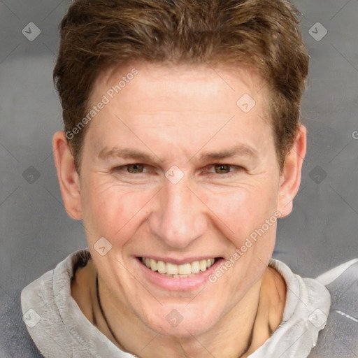 Joyful white adult female with short  brown hair and grey eyes