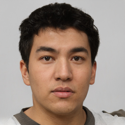 Neutral white young-adult male with short  black hair and brown eyes