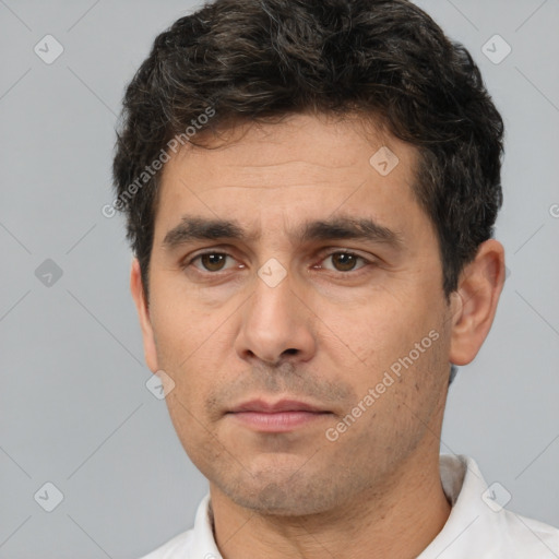 Neutral white adult male with short  brown hair and brown eyes