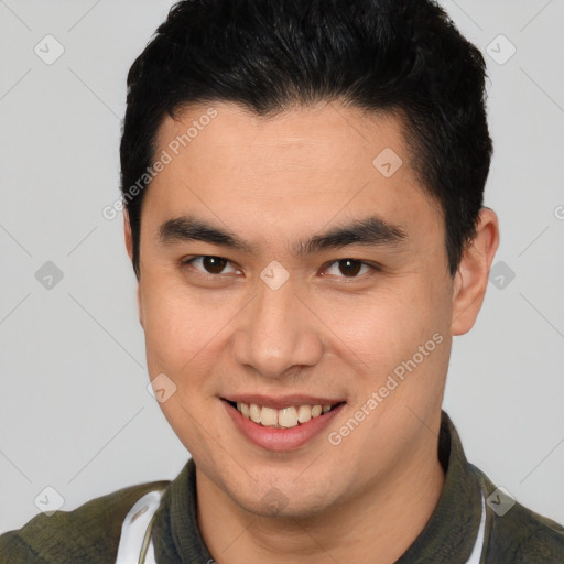 Joyful latino young-adult male with short  brown hair and brown eyes