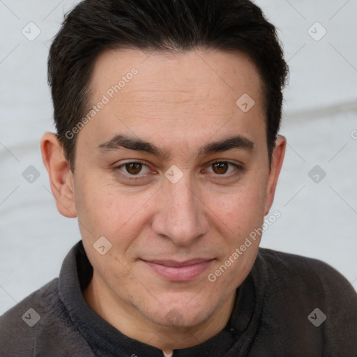 Joyful white adult male with short  brown hair and brown eyes