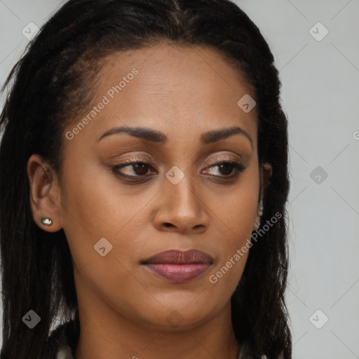 Joyful black young-adult female with long  brown hair and brown eyes