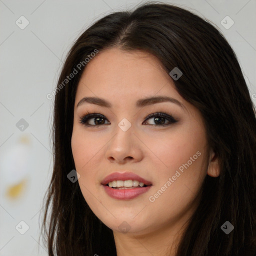 Joyful asian young-adult female with long  brown hair and brown eyes