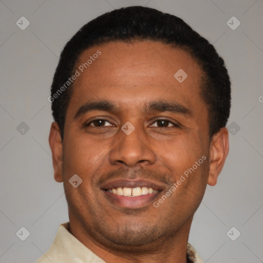 Joyful latino young-adult male with short  black hair and brown eyes