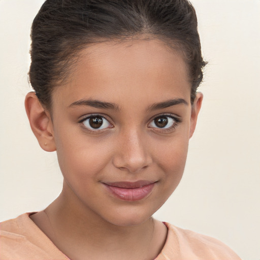 Joyful white child female with short  brown hair and brown eyes