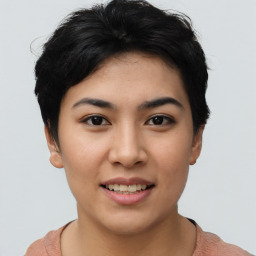 Joyful asian young-adult female with short  black hair and brown eyes