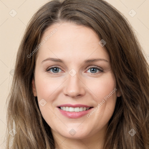 Joyful white young-adult female with long  brown hair and green eyes