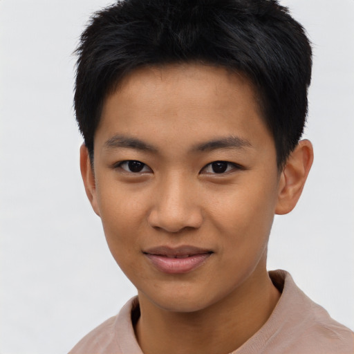 Joyful asian young-adult male with short  black hair and brown eyes