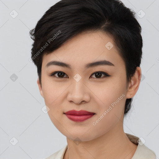 Joyful asian young-adult female with medium  black hair and brown eyes