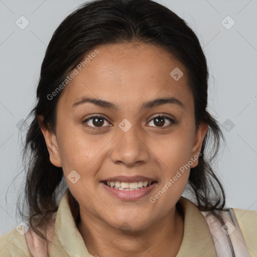 Joyful latino young-adult female with medium  brown hair and brown eyes