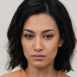 Neutral asian young-adult female with medium  brown hair and brown eyes