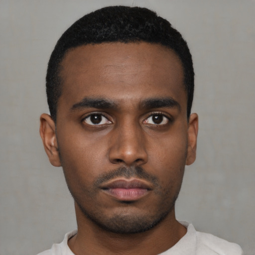 Neutral black young-adult male with short  black hair and brown eyes