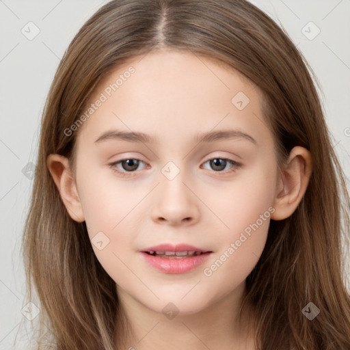 Joyful white child female with long  brown hair and brown eyes