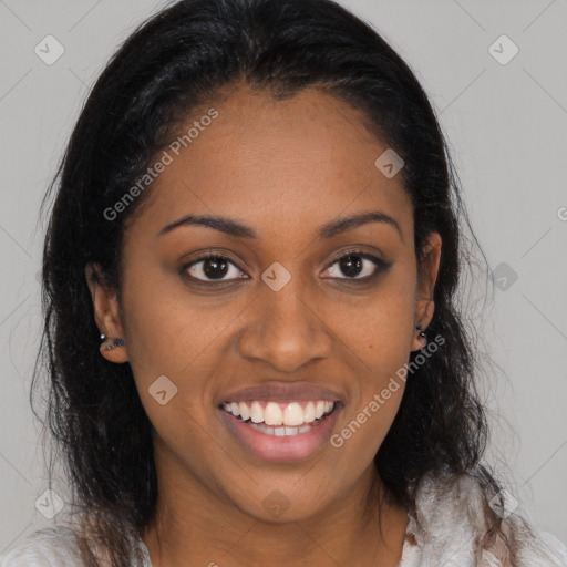 Joyful black young-adult female with medium  brown hair and brown eyes