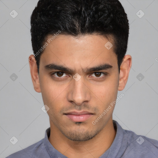 Neutral white young-adult male with short  black hair and brown eyes