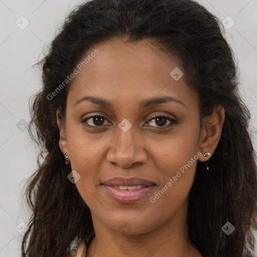 Joyful black young-adult female with long  brown hair and brown eyes