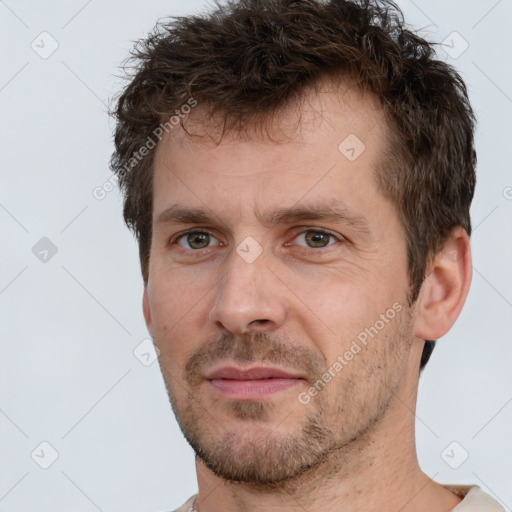 Neutral white adult male with short  brown hair and brown eyes