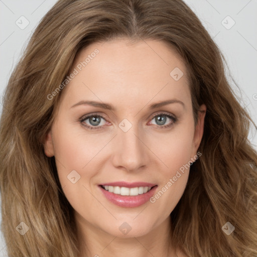 Joyful white young-adult female with long  brown hair and green eyes