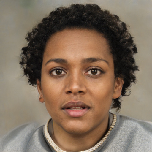 Neutral black young-adult female with short  black hair and brown eyes