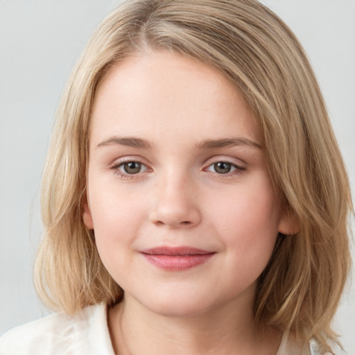 Joyful white child female with medium  brown hair and brown eyes