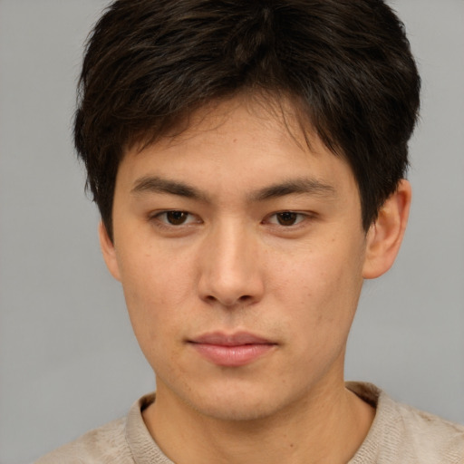 Neutral asian young-adult male with short  brown hair and brown eyes