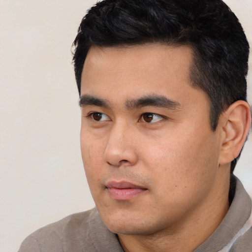 Neutral asian young-adult male with short  black hair and brown eyes