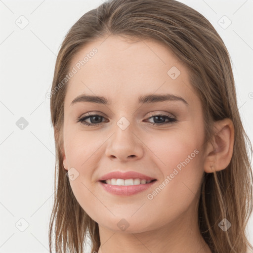 Joyful white young-adult female with long  brown hair and grey eyes