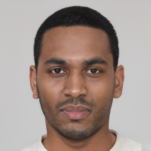 Neutral black young-adult male with short  black hair and brown eyes