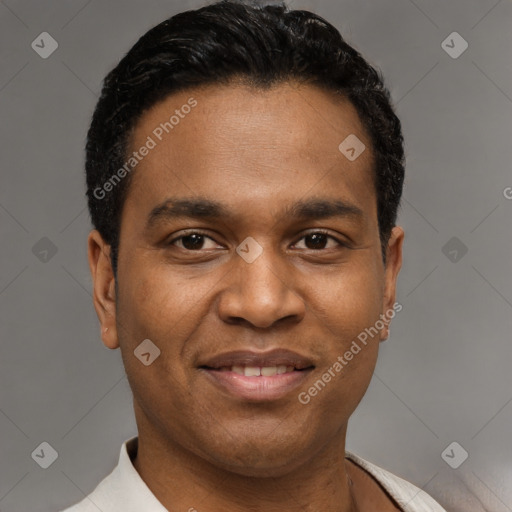 Joyful latino young-adult male with short  black hair and brown eyes
