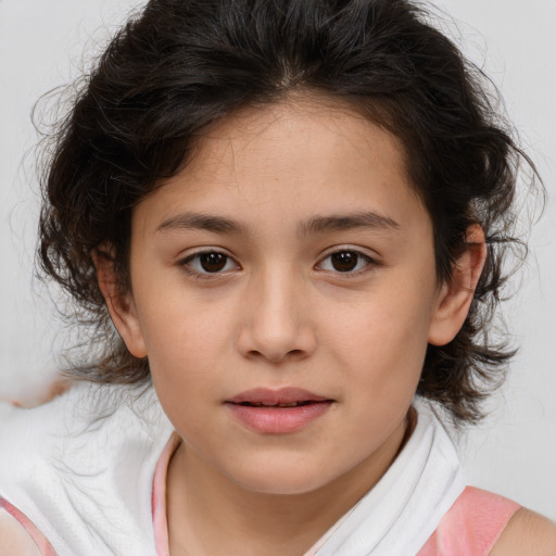 Joyful white child female with medium  brown hair and brown eyes