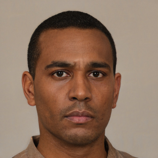 Neutral black young-adult male with short  brown hair and brown eyes
