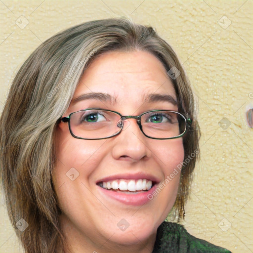 Joyful white adult female with medium  brown hair and green eyes