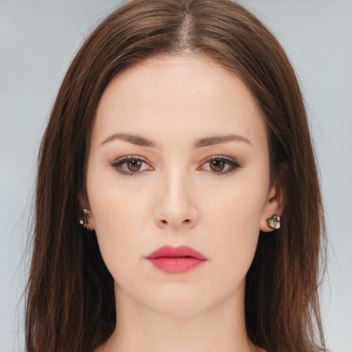 Neutral white young-adult female with long  brown hair and brown eyes