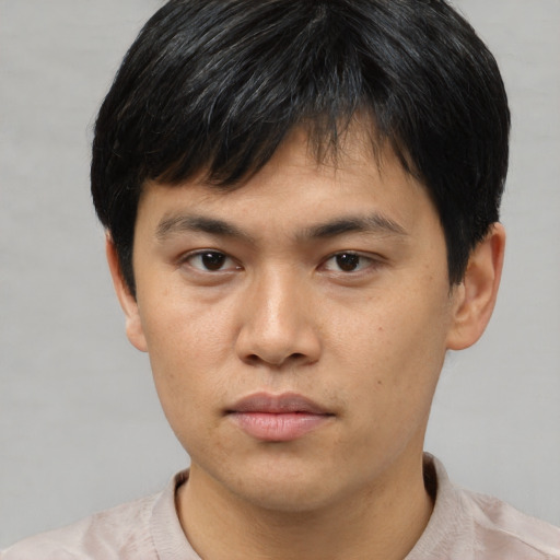 Neutral asian young-adult male with short  black hair and brown eyes
