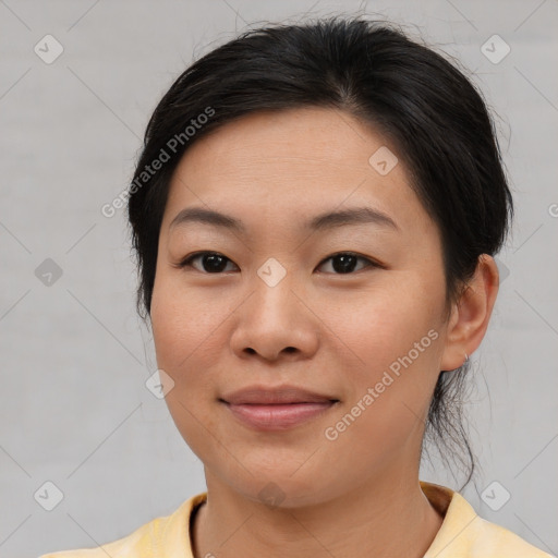 Joyful asian young-adult female with short  brown hair and brown eyes