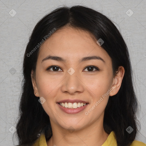 Joyful latino young-adult female with medium  brown hair and brown eyes